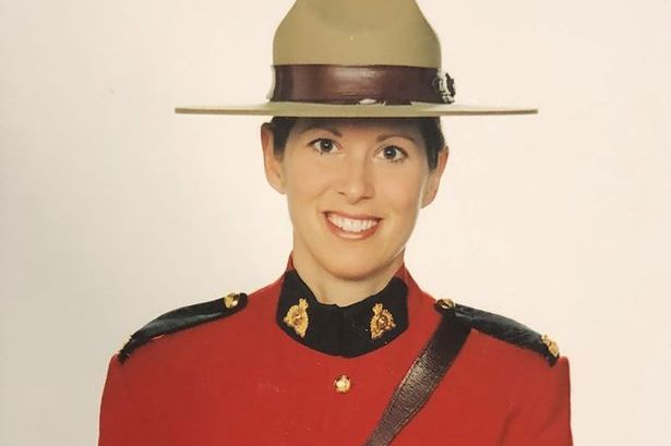 1 RCMP Constable Heidi Stevenson poses for an undated official photo கனடாவில் துப்பாக்கிச்சூடு;பெண் காவலர் உட்பட 16 பேர் பலி